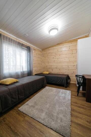 Фото номера Коттедж с 3 большими спальнями Дома для отпуска Jokiniemen Matkailu Cottages г. Tölvä 19