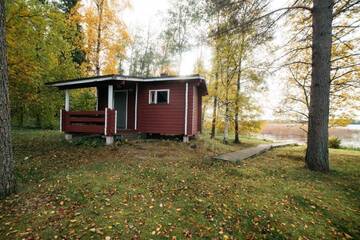 Фото номера Коттедж с 3 спальнями и сауной - А Дома для отпуска Jokiniemen Matkailu Cottages г. Tölvä 5