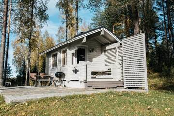 Фото номера Коттедж с 3 большими спальнями Дома для отпуска Jokiniemen Matkailu Cottages г. Tölvä 8